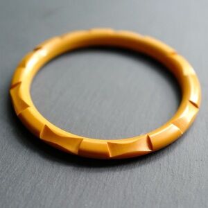 Vintage Carved Bakelite Yellow Bangle